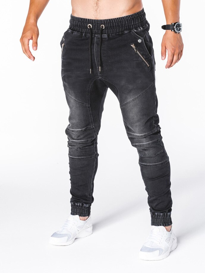 Höstens europeiska och amerikanska tvättade denimtyg för män sportbyxor och benvärmande jeans