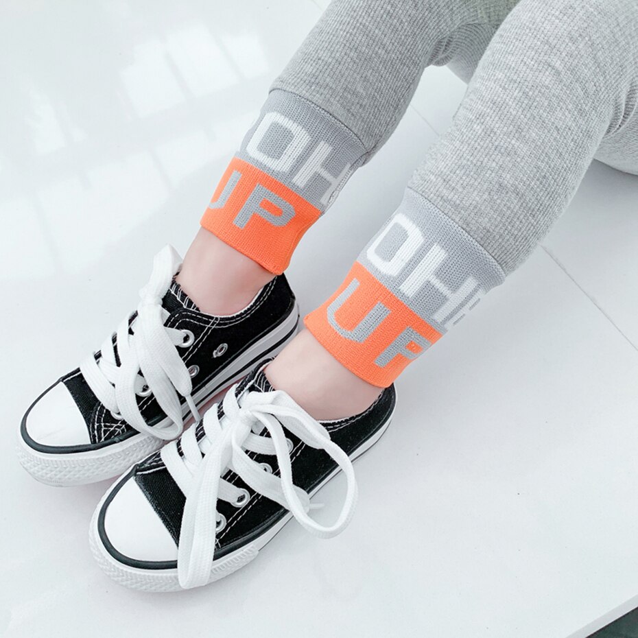 Leggings ragazza lettera ragazze pantaloni Slim pantaloni Patchwork per bambini primavera autunno bambino ragazza vestiti stile Casual