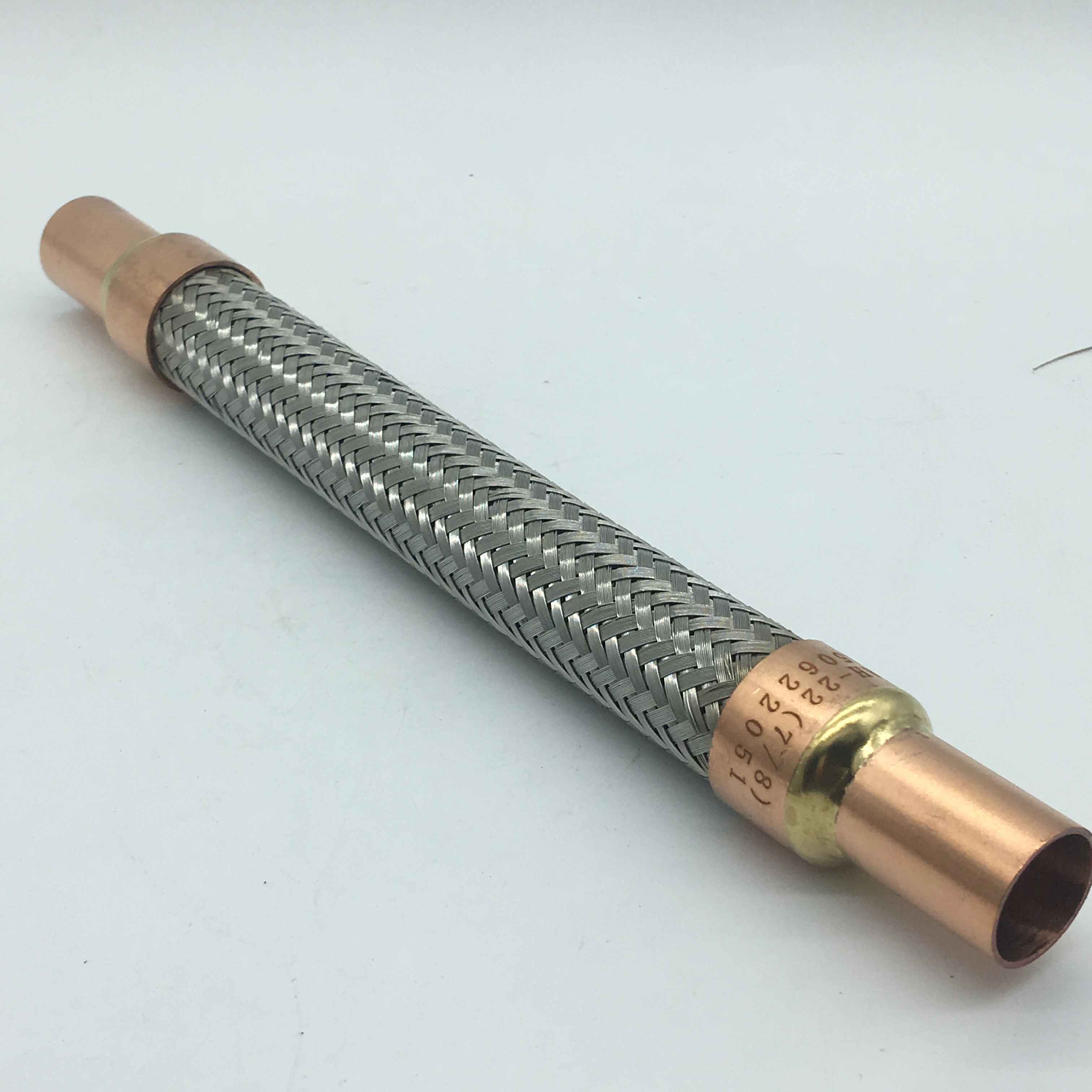 7/8" vibration absorber is both on suction and discharge lines of a refrigerating system, as close as possible to the compressor