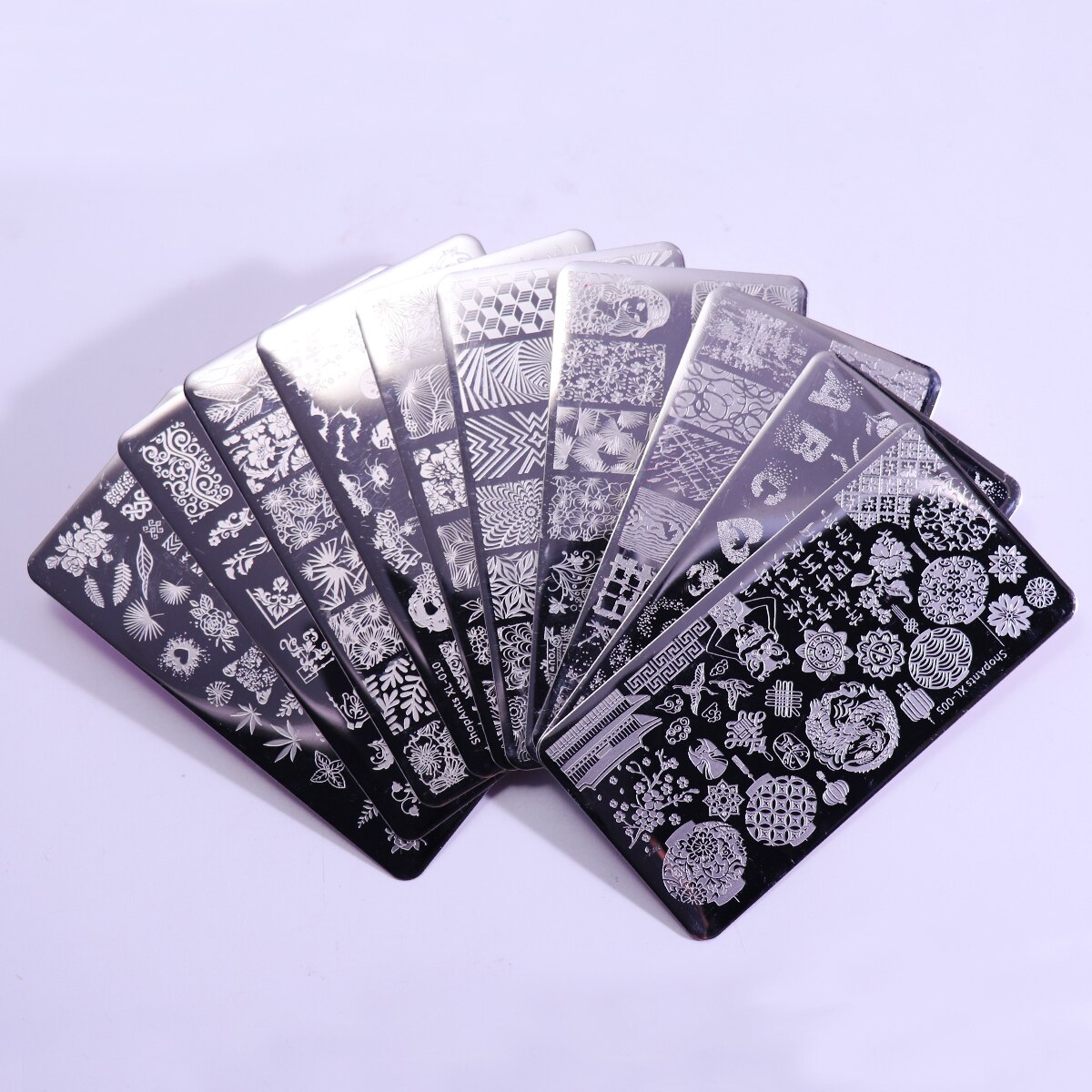 Conjunto de placas para estampado de uñas, de acero inoxidable, 6x12cm, 10 Uds., hojas de flores, geométricas, animales, plantillas de arte para uñas, XL-001-XL-020 para tiendas: XL-001-010