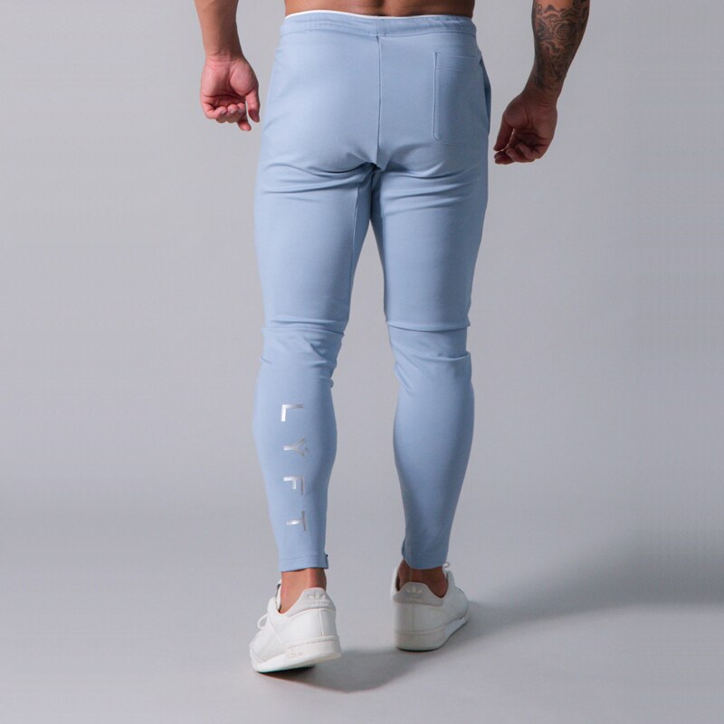 Pants men's jogging fitness track pants men's Korean casual slim hit color jogging trousers