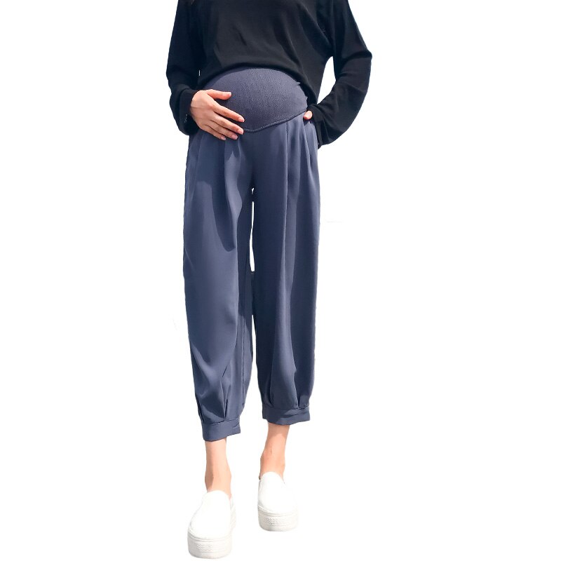 Forår og efterår gravid kvindes mave lige bukser af push-up ensfarvede højtaljede barselsbukser med løse mave