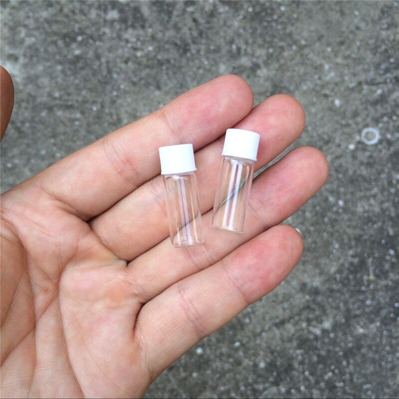 1ml miniglasflaskor flaskor vit plastlock tomma små genomskinliga glasflaskor skruvkork 10*28*6mm 100 st