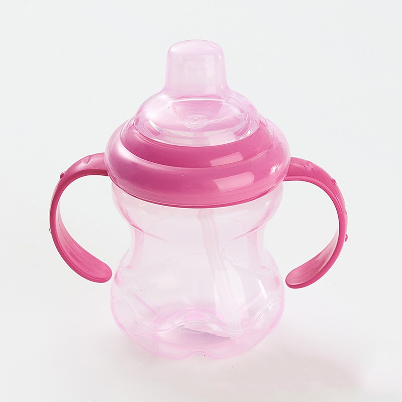 Babymugg barn utomhussportmuggar med handtag läckagesäker sugkopp plastmugg baby learning drickskopp: Rosa