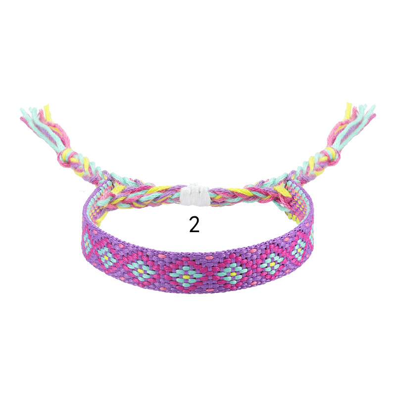 Nepal etnico tessuto braccialetto fatto a mano amicizia treccia corda tessuto cinturino a mano ricamo braccialetto nappe coppia Boho Wrap donna uomo: Rhodium d'imitazione placcato