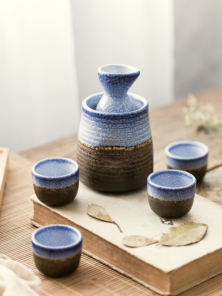 Keramische sake wijn set warm wijn pot thuis geel wijnfles wit glas wijn separator