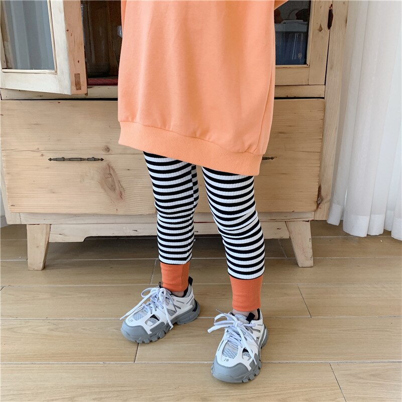 Baby meisjes zwart wit gestreepte stiksels leggings katoen lente zomer slim fit geribbelde lange broek patchwork broek