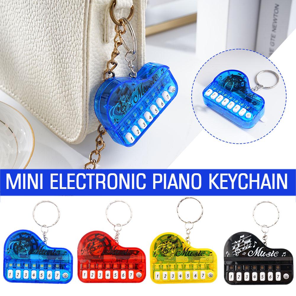 mini pianoforte elettronico portachiavi in lega tastiere musicali musica luminosa portachiavi in metallo ciondolo gioielli giocattoli catena portachiavi G G0P1