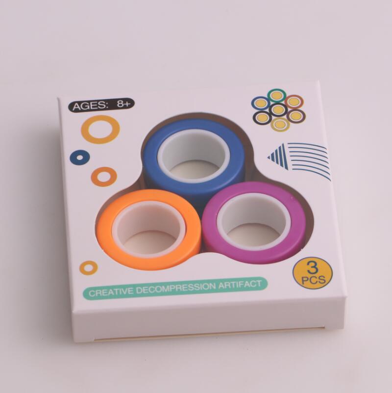 Anti-stress magnetiska magiska ringar packa upp leksaker för magiker trick rekvisita dekomprimering magiska trick små ornament: Orange blå lila