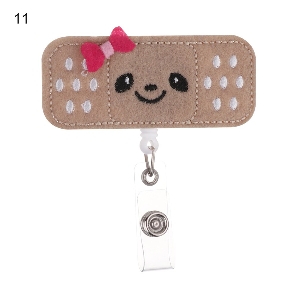1pc klud sygeplejerske udtrækkeligt badge pull spænde hjul clip sød tegning bandage stil studerende id-kort badge holder: 11
