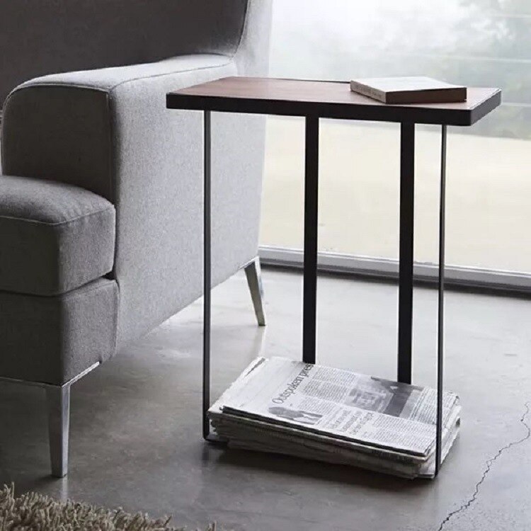 Several iron furniture storage stool beside sofa coffee cup notes storage table