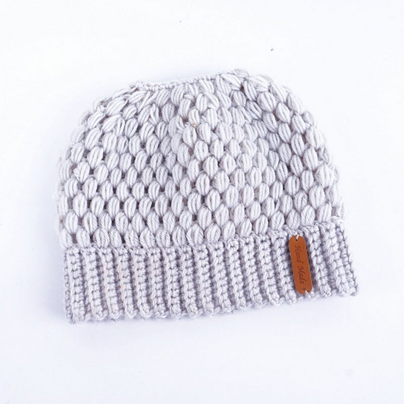 Kvinder vinter strik hatte damer pige stretch strik hat med tag rodet bolle hestehale beanie holey varme hatte kasketter: Beige