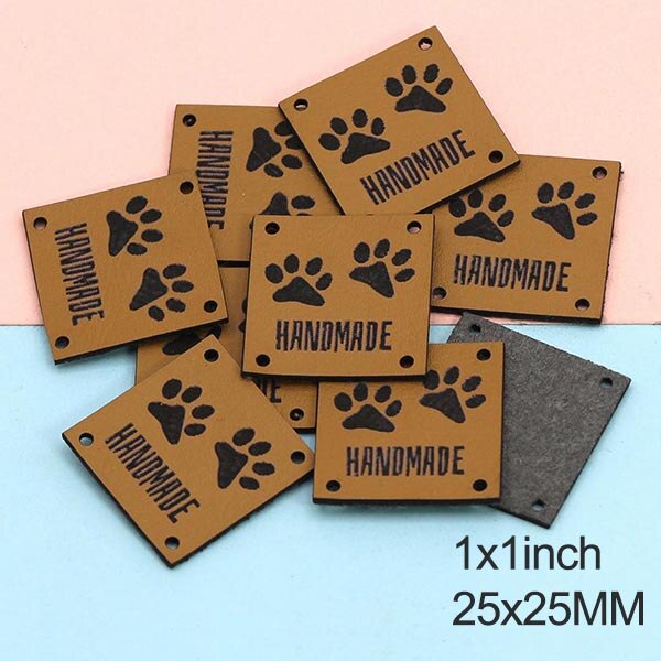 Etiquetas de cuero con huellas de animales, etiquetas hechas a mano para ropa, perro, gato, oso, pata, etiqueta hecha a mano para coser sombreros DIY, 20 piezas, 25x25mm: Brown