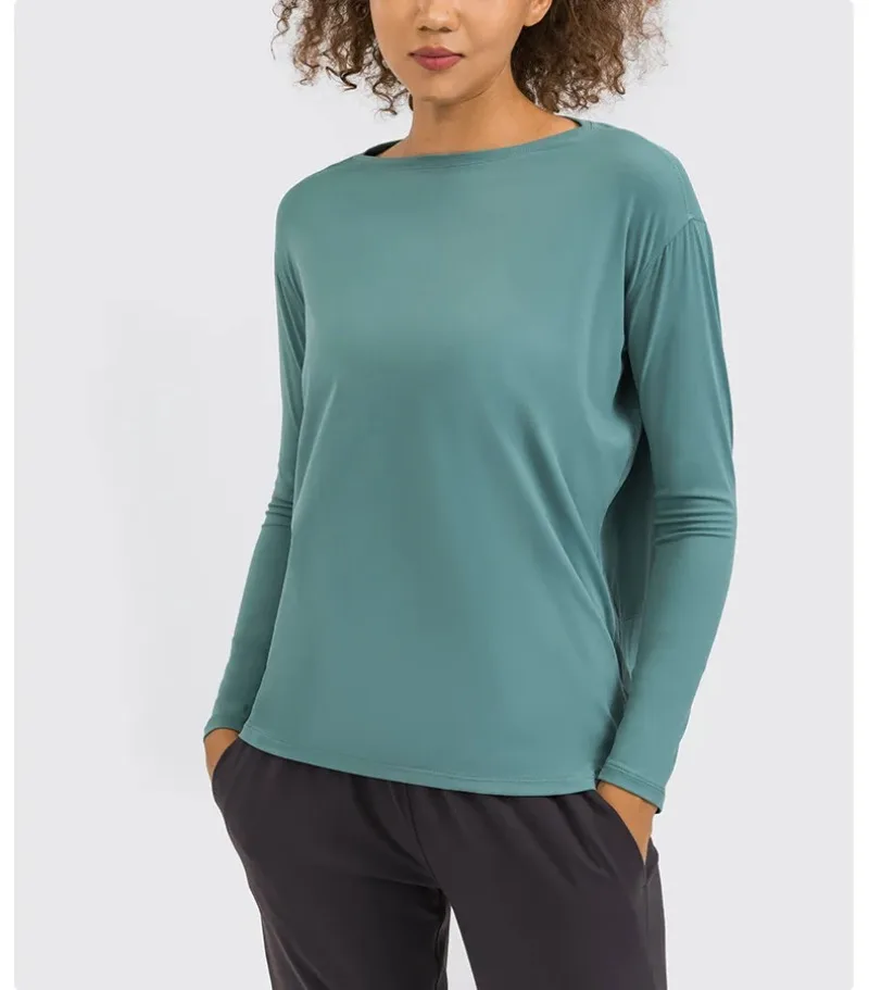 Løst yogatøj til kvinder til forår og efterår, nøgen og hudvenlig tynd fitnesssports-pendler-t-shirt med lange ærmer