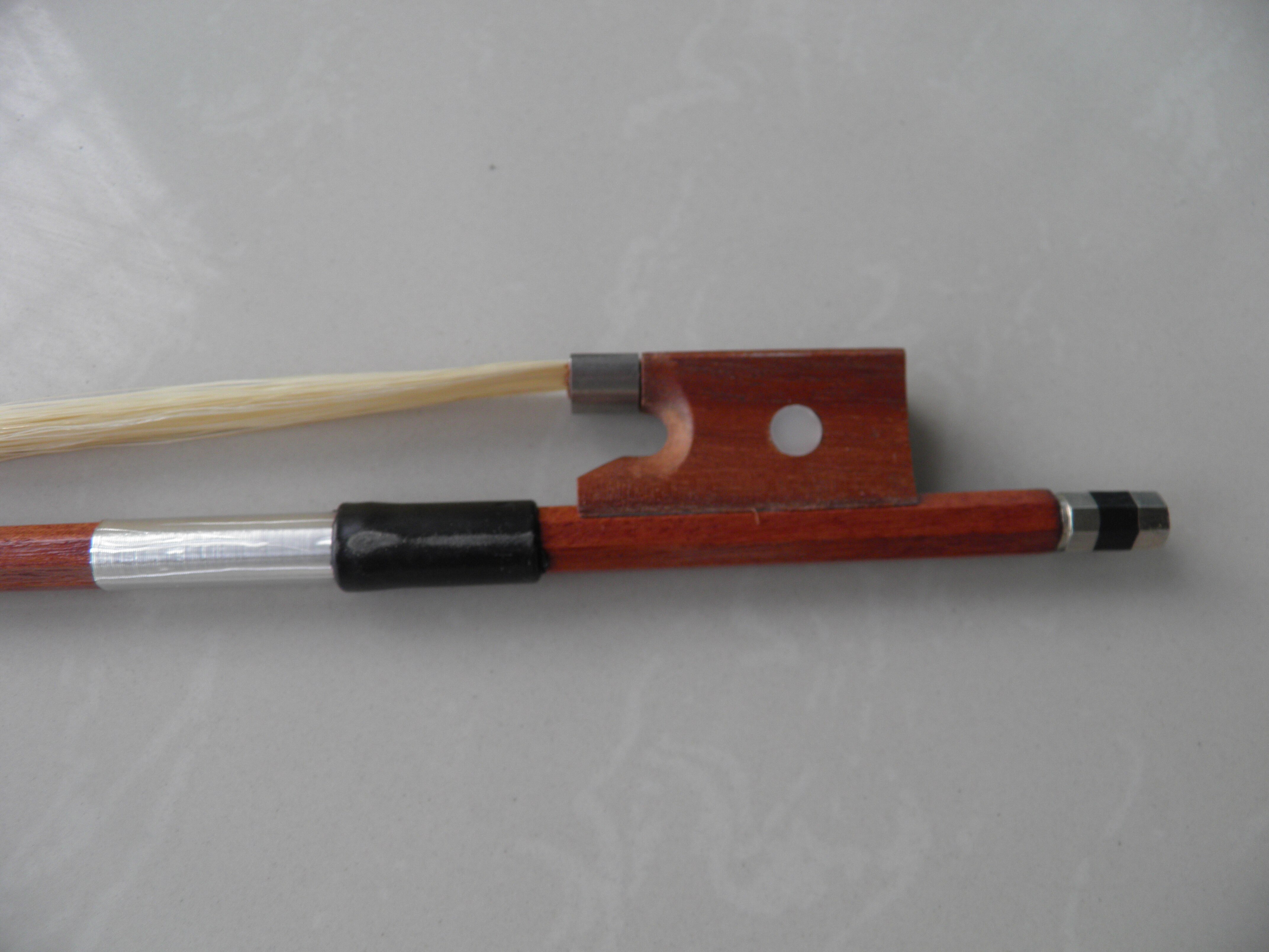 brown wooden cello bow