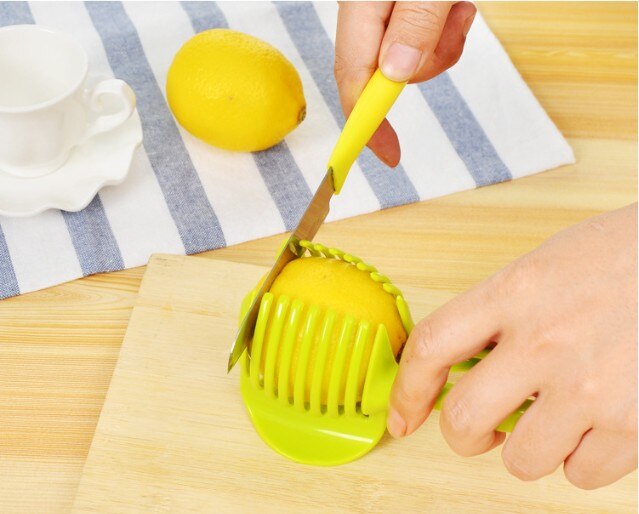 1PC Tomato Slicer Plastic Fruits Cutter Tool Perfect Slicer Tomato Potato Onion Shreadders Slicer Lemon Cutting Holder KX 023