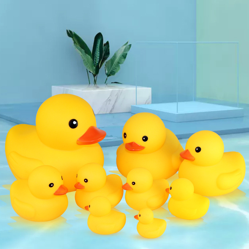 Cute little yellow duck vinyl material sound-making children's bath toy decoration accessory