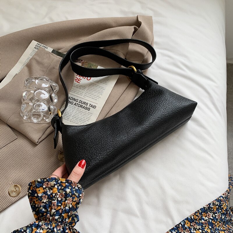 Tekstura torba damska lato 2021 nowa moda koreańnarty styl jedno ramię torba strąk pachami prosty jednolity kolor torba: czarny