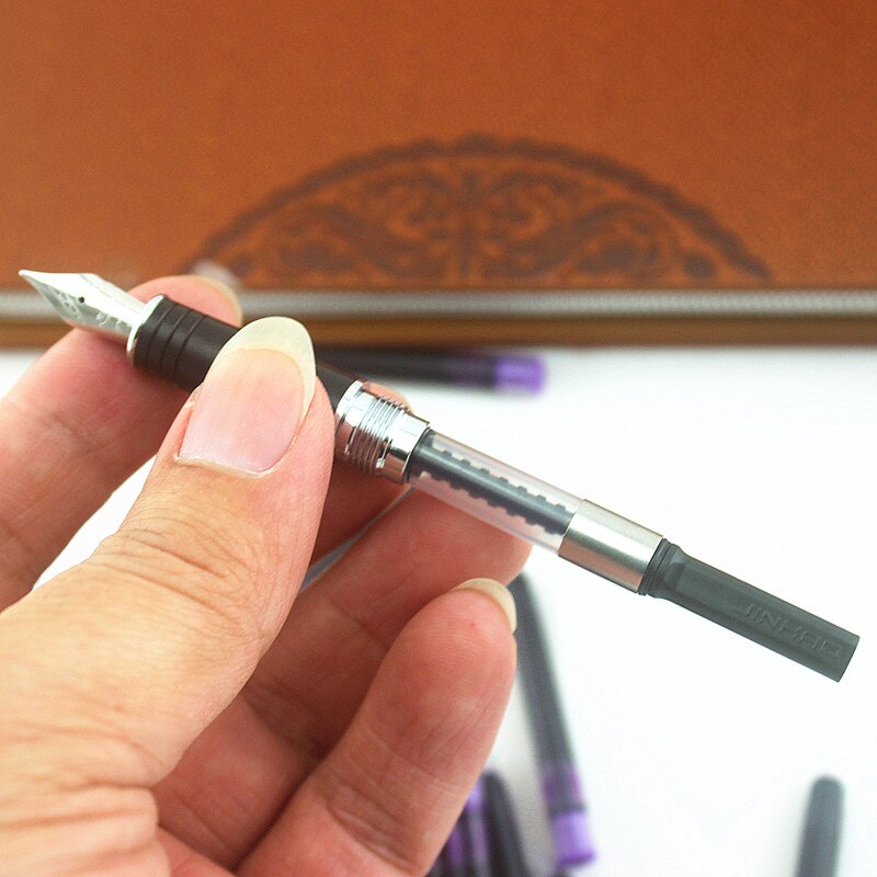 Jinhao-pluma estilográfica Universal, cartuchos de tinta, recarga de pluma, color negro, morado y azul, 20 Uds.