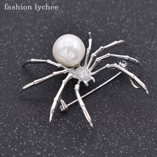 lychee exagerados antiguos broches de Color plata Pins perlas artificiales cuerpo pavimentar la cabeza araña mujeres Pins: White