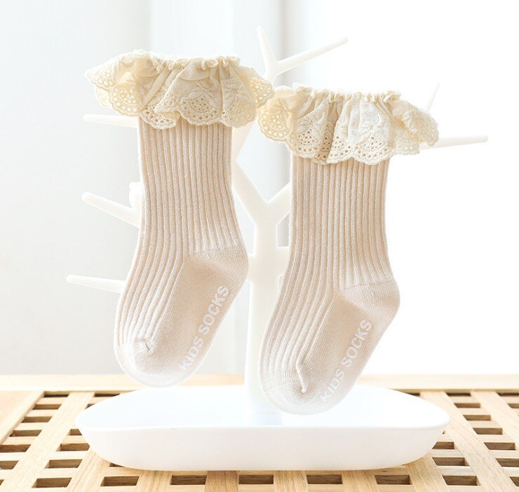 Calcetines de encaje de princesas para niñas, medias con pegamento antideslizante de tubo mediano, medias tejidas con volantes y ojales para niños