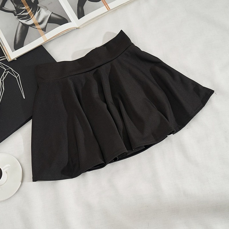 Falda con textura de cintura elástica negra, faldas acampanadas de corte A, falda minimalista corta de cintura alta de otoño para mujer, nueva ropa de talla vintage
