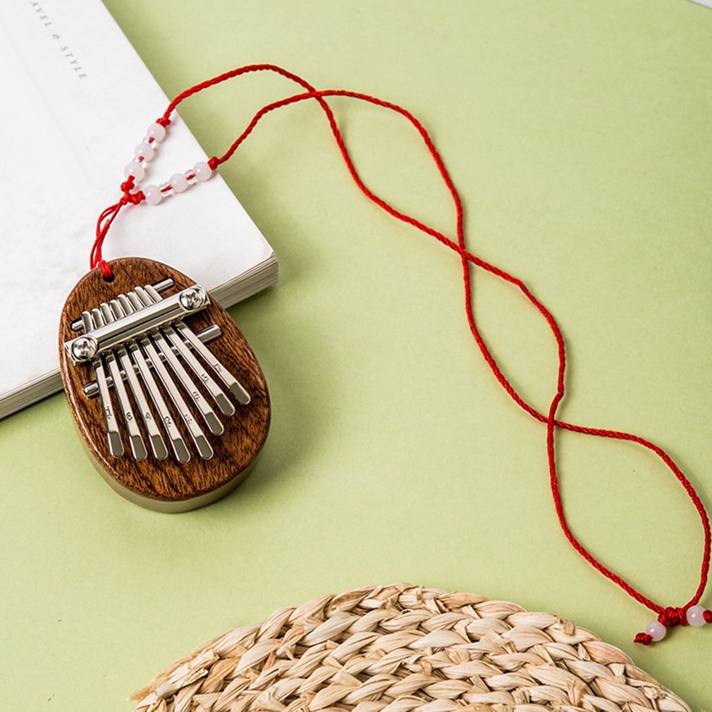 8 clave Mini Piano de pulgar Kalimba de madera de exquisito dedo pulgar Piano Marimba accesorio para instrumentos musicales de Año