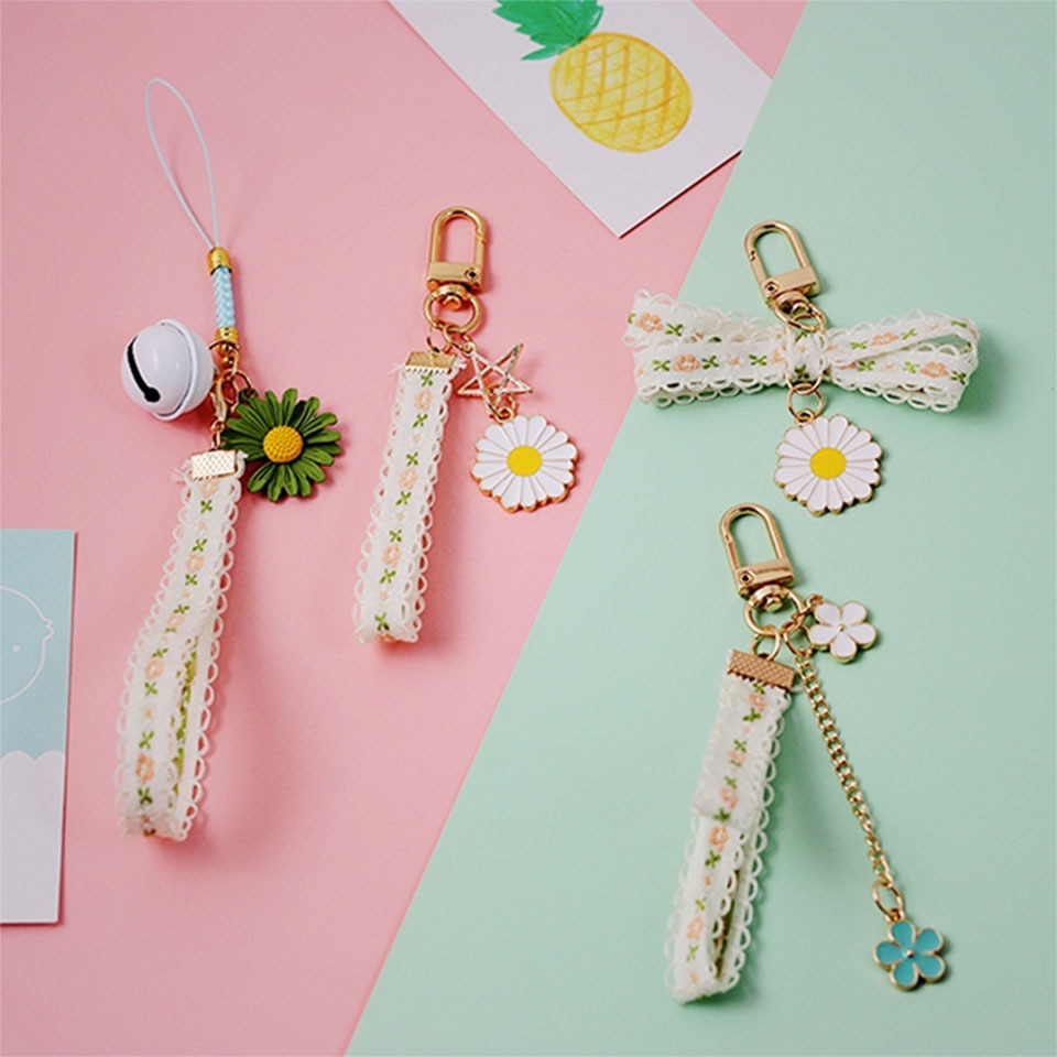 Söt tusensköna blomma svett färsk spets smart telefonrem snoddar för iphone samsung dekor mobiltelefon handledsrem rep telefon charm