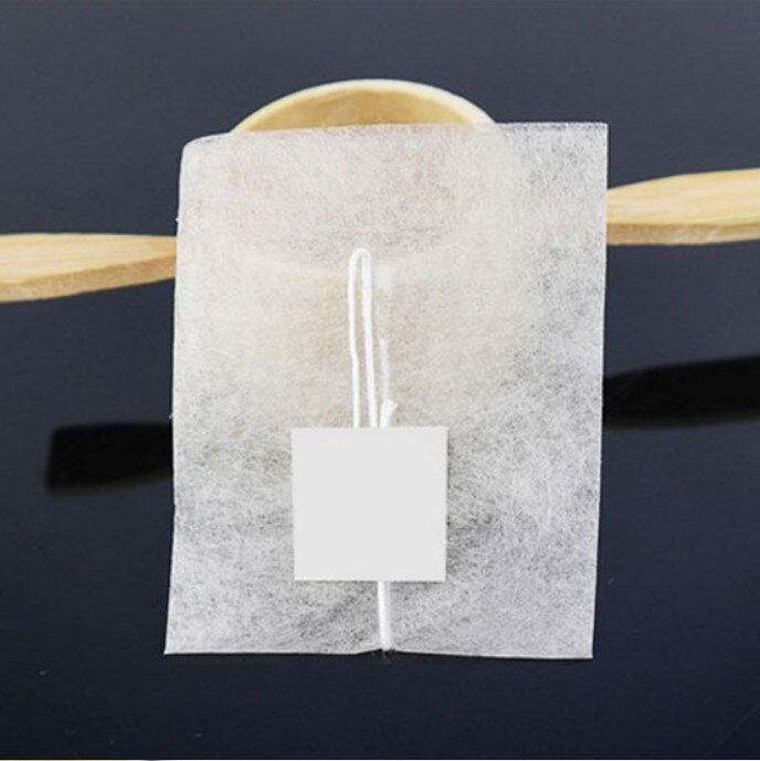 Sachets de thé jetables thermoscellés, 100 pièces/lot, filtre en Fiber de maïs, étiquette blanche: 65x80mm
