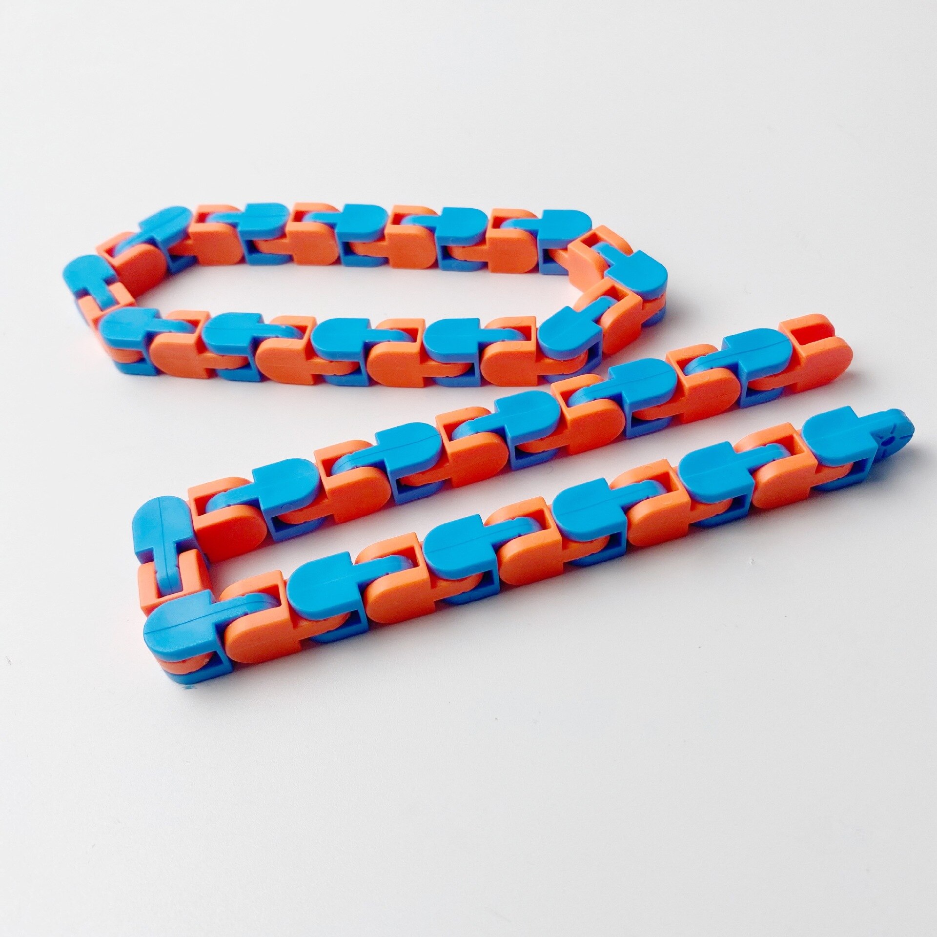 24 Links Wacky Tracks Snap Klik Fidget Speelgoed Vinger Zintuiglijke Snake Puzzels Voor Stress Party Bag Vulstoffen Party Gunsten: blue orange