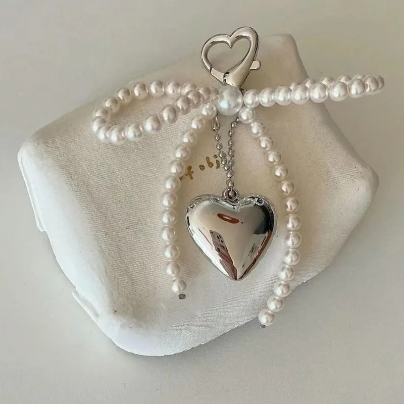 LLavero con forma de corazón y lazo de perlas, mochilas, llavero con forma de corazón con lazo, accesorios colgantes DIY para bolso, teléfonos móviles universales