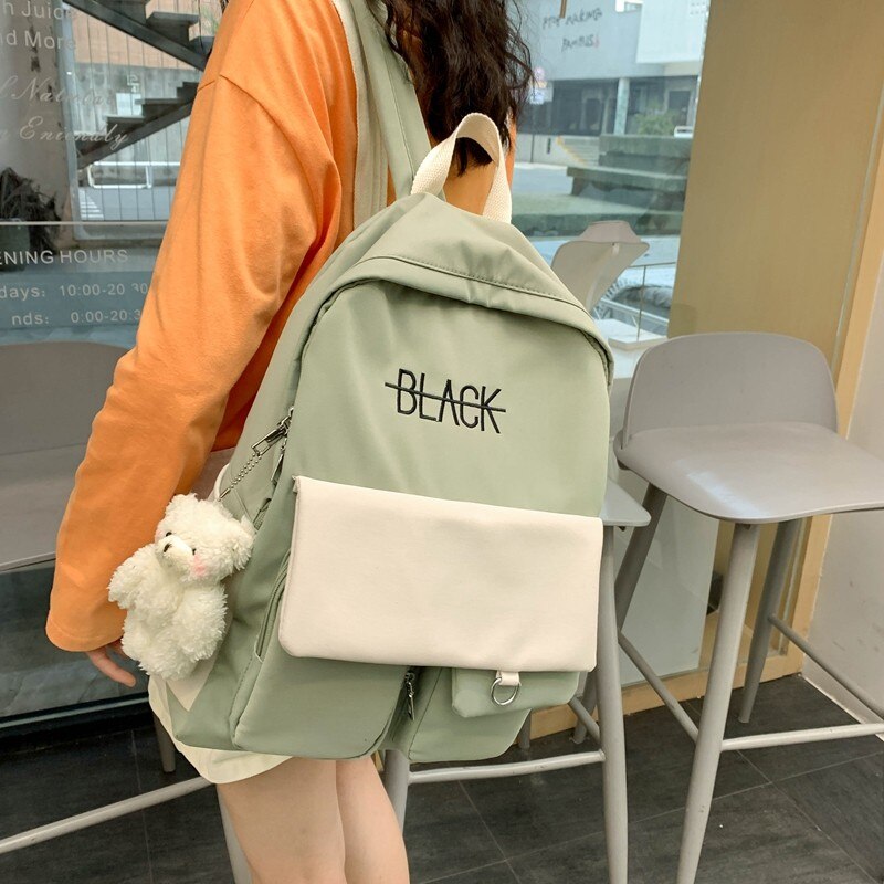 Nouvelle tendance femme sac à dos sacs d'école imperméables pour adolescentes grande poche Nylon couleur bonbon collège sac à dos Mochila