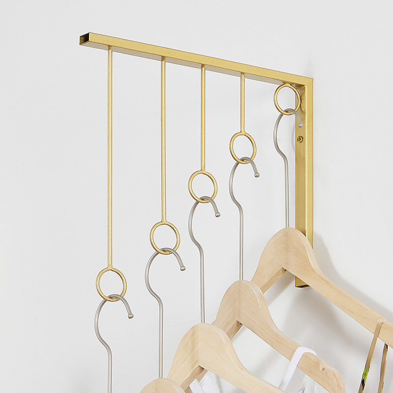 Perchas doradas para tienda de venta de ropa, estante de exhibición, estante de arte del hierro, gancho de pared, expositor de ropa, ahorro de espacio, organizador de ropa interior para guardarropa