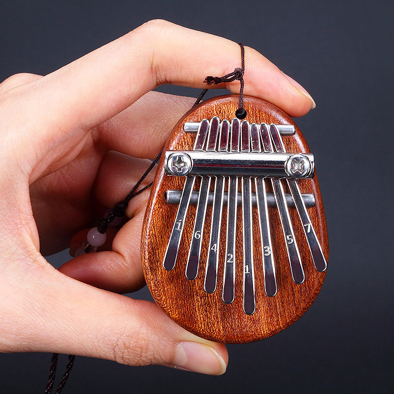 Mini Kalimba de 8 teclas, Piano de pulgar, Marimba, Musical, buen accesorio colgante,