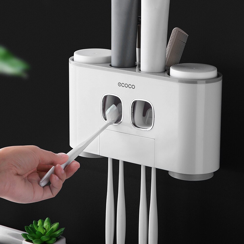 ecoco Toothbrush Holder Toothpaste Dispenser Wall-Mounted Toothpaste Squeezer With 4 Cups Bathroom Accessories