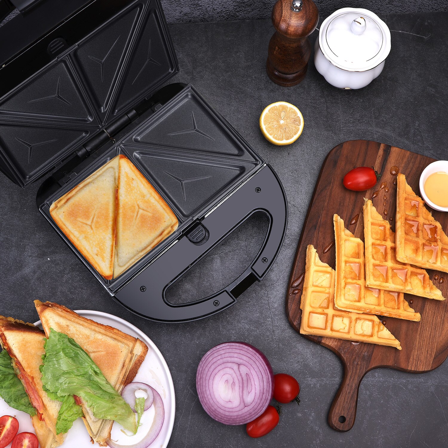 Aigostar Robin 30OGQ - Sandwichera 3 en 1: grill, gofres y sandwichera. 750W, placas antiadherentes extraíbles, termostato hasta 215ºC, almacenamiento vertical y asa de toque frío.