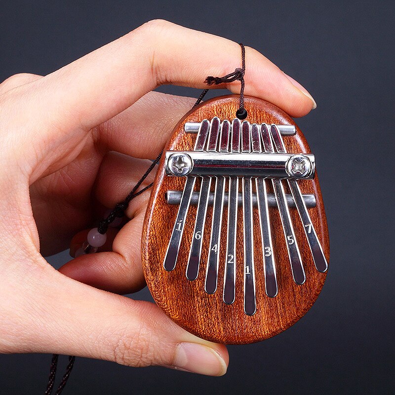 8 clés Mini Kalimba exquis doigt pouce Piano Marimba Musical bon accessoire pendentif
