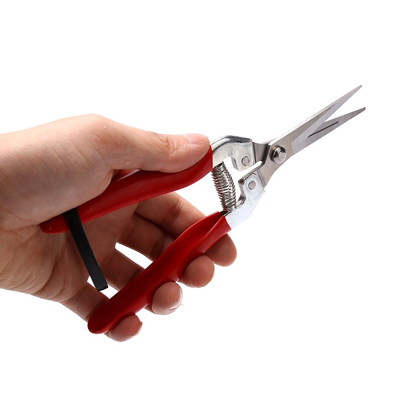 Tuingereedschap hakselaar schaar snijder tuinieren snoeien gras bloem