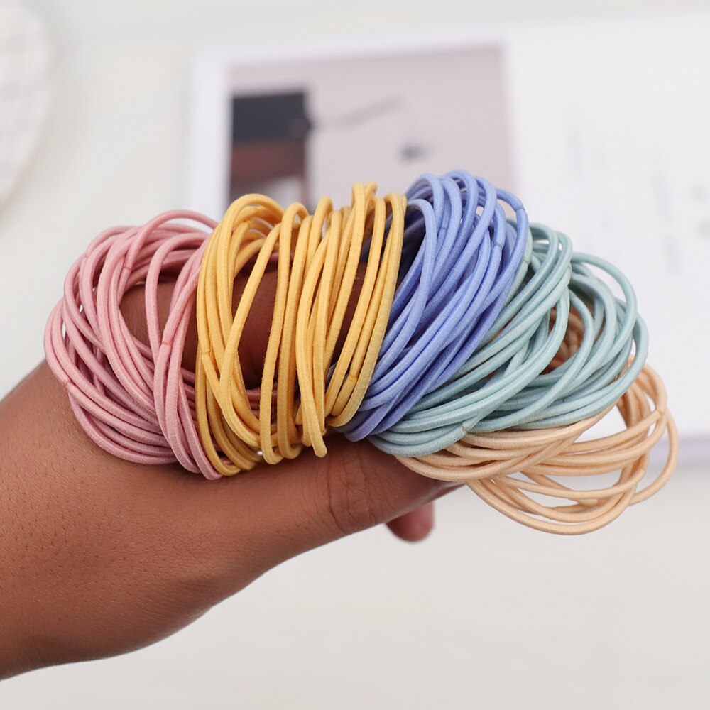 Gomas elásticas de goma para el pelo para niñas y mujeres, gomas finas de colores de 2MM de grosor, accesorios básicos para el cabello, goma bonita para el pelo, botella de 4CM, 100 Uds.