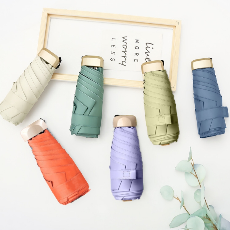UPF50 + Mini sombrilla de bolsillo pequeño paraguas de viaje para la lluvia paraguas plegable de vinilo protección UV parasol de bolsillo cápsula