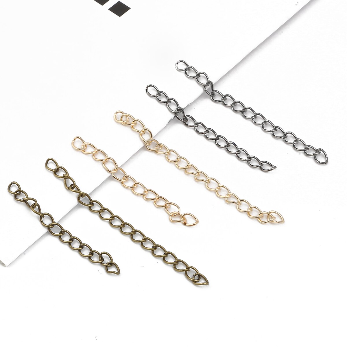 50 stk/parti 5cm 7cm kjedeforlenger armbånd forlenger forlengelse haler koblinger for smykker å gjøre selv-funn