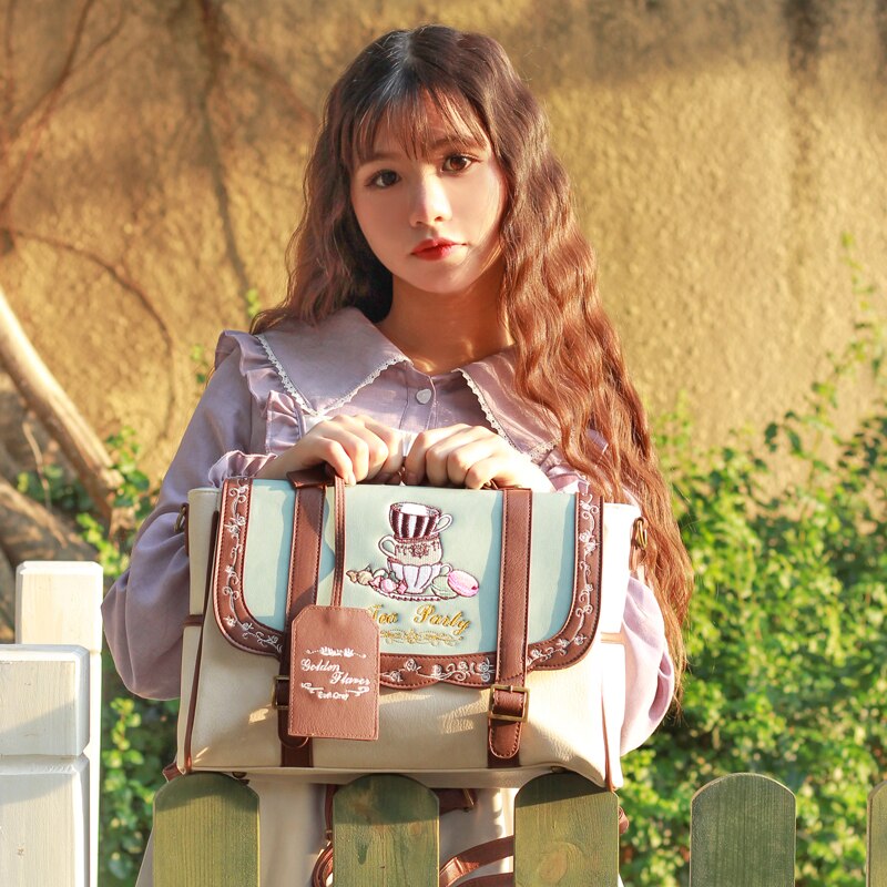 Mochila japonesa lolita para mujer, bolsa pequeña dulce con bordado de reducción de edad, bolso escolar A4 de hombro de 3 vías