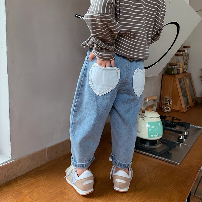 Primavera autunno neonate moda schiena a forma di cuore tasca All-match Jeans bambini bambini Patchwork vita pantaloni Casual in Denim