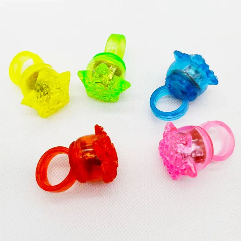 50pcs Light up Rings Bumpy Jelly Rubber Ring Glow Party Favor Finger Lights for Kids Birthday Party Christmas Halloween Festival: Blue