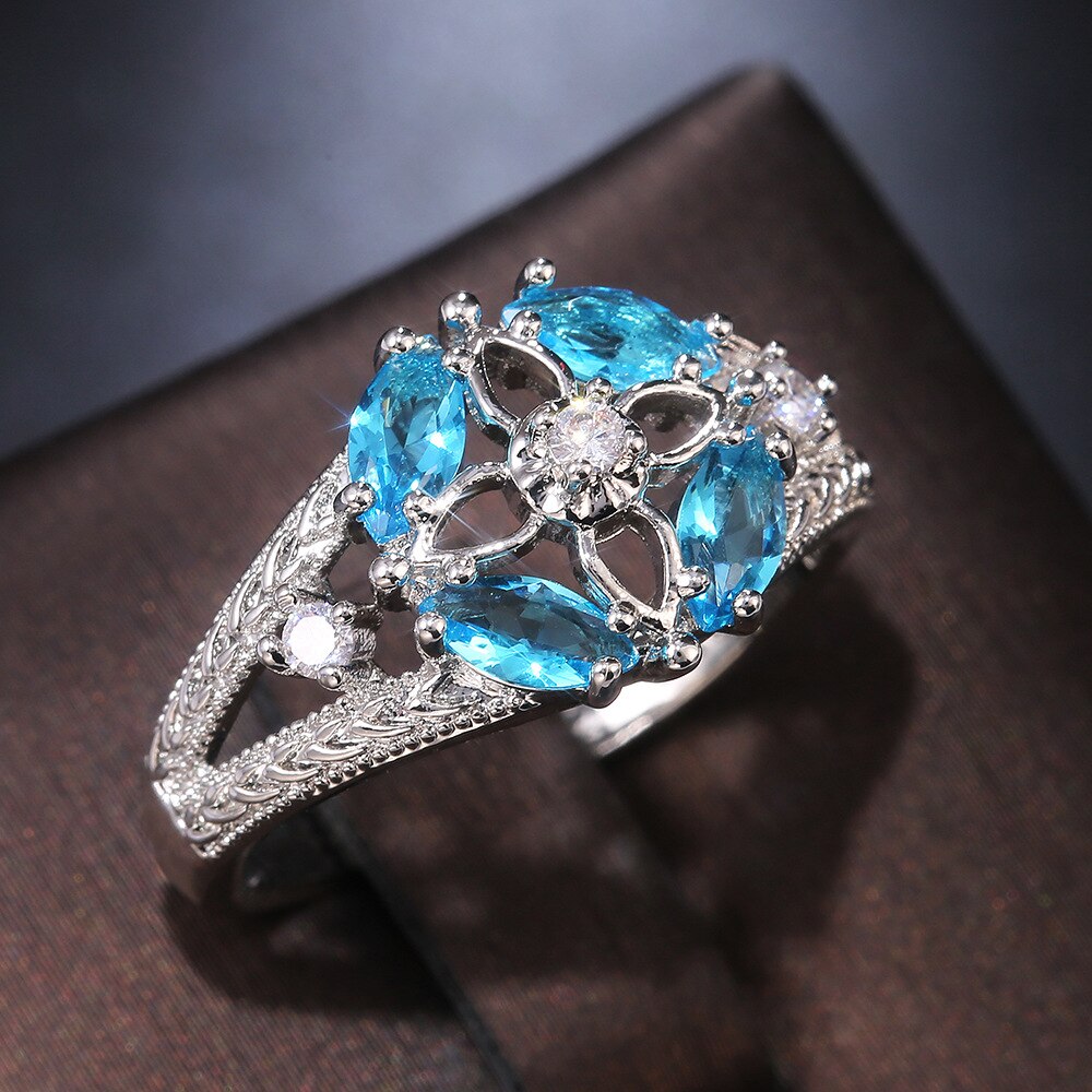 Mode Eenvoudige Blauwe Rhinestone Crystal Hollow Klavertje Vier Ring Voor Dames Wedding Bridal Lover Ringen Hand Sieraden