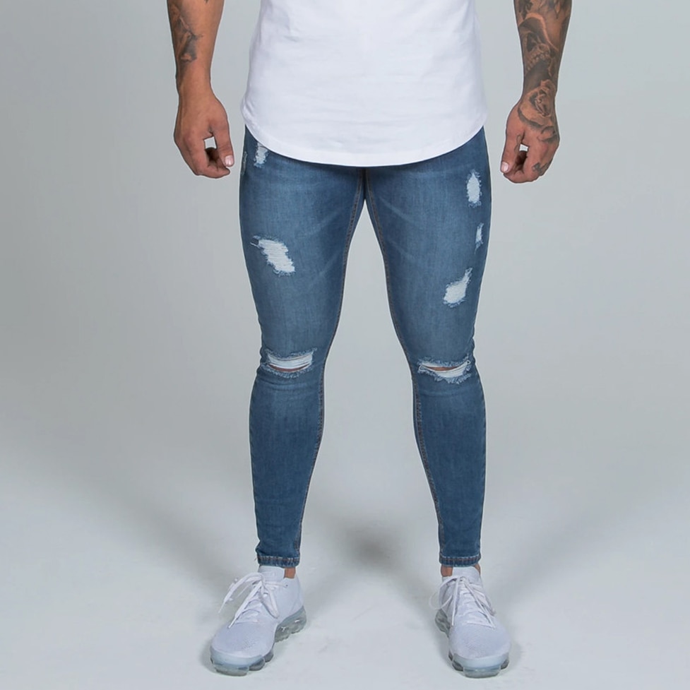 sprühen auf Männer der Jeans Zerrissene Hosen Super schlank Fitnessraum Sport strecken Denim Hosen Elastische Europäischen Jeansy