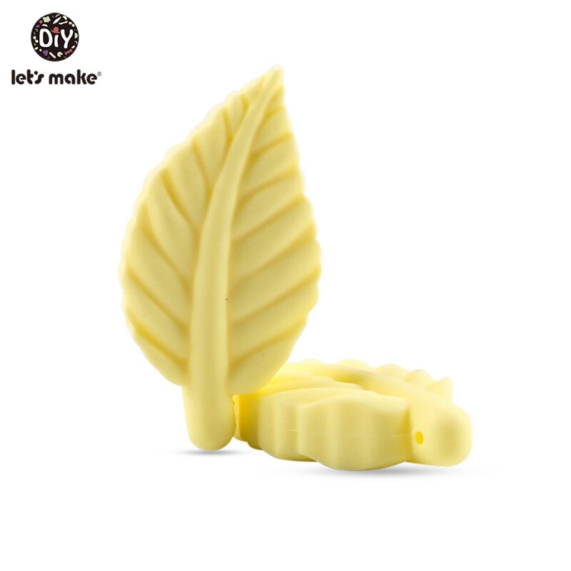 Låt oss göra 50pc silikonpärlor för babyskallerleksaker på sängkläder spjälsäng mobilhänge babybitring leksak pärlor blad: Godisgul