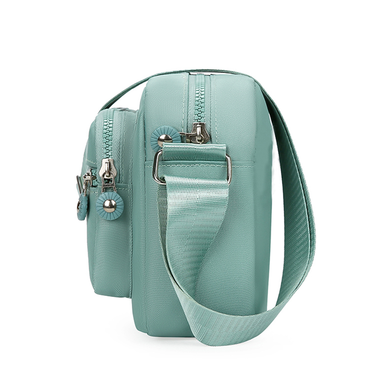 Bolso de mano de estilo neutro hecho de tela de nailon liviana y sencilla, bolso de mujer de un solo hombro. [La dirección de la cremallera está corrió