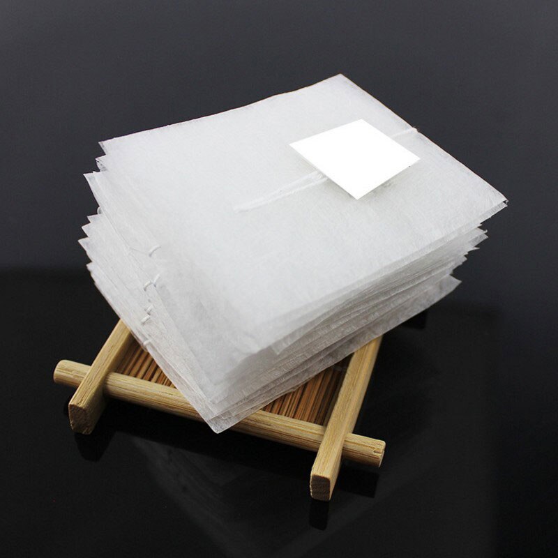 Sachets de thé jetables thermoscellés, 100 pièces/lot, filtre en Fiber de maïs, étiquette blanche