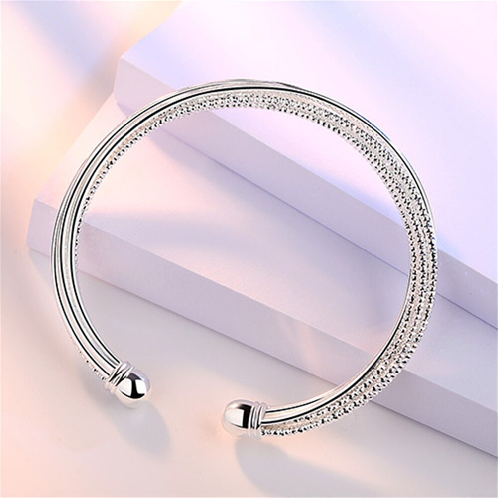 S999 – modèle de bracelet pour femme, couleur argent, ligne torsadée, bouche ouverte, simple, ligne florale de voiture, bijoux